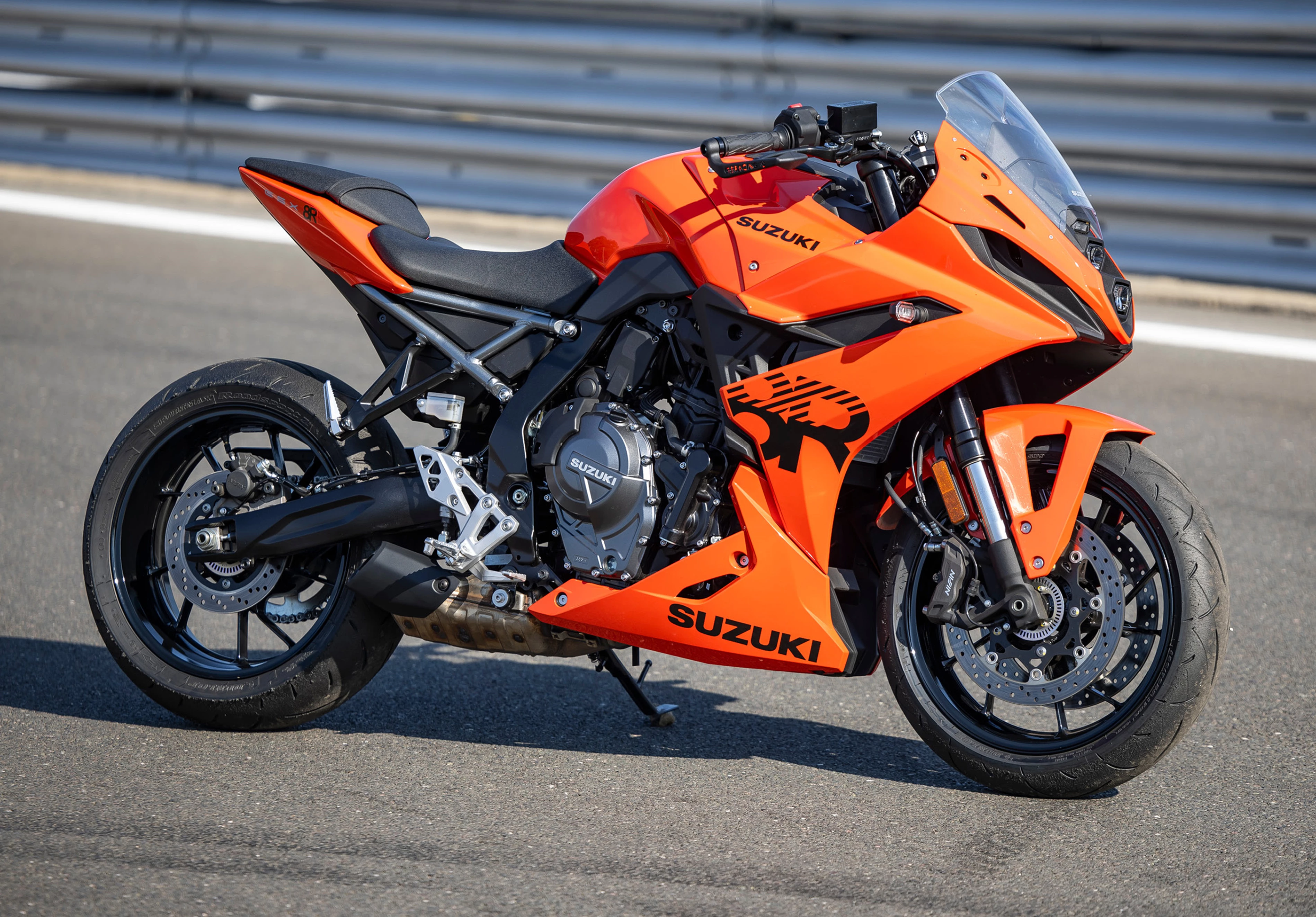Suzuki GSX-8R right hand side on in a pitlane. 