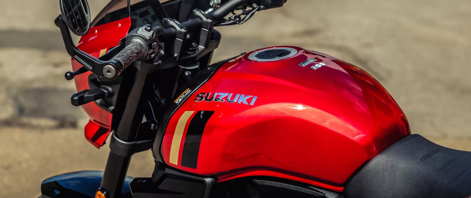 Suzuki GSX-8TT red left hand side looking over the tank and bars
