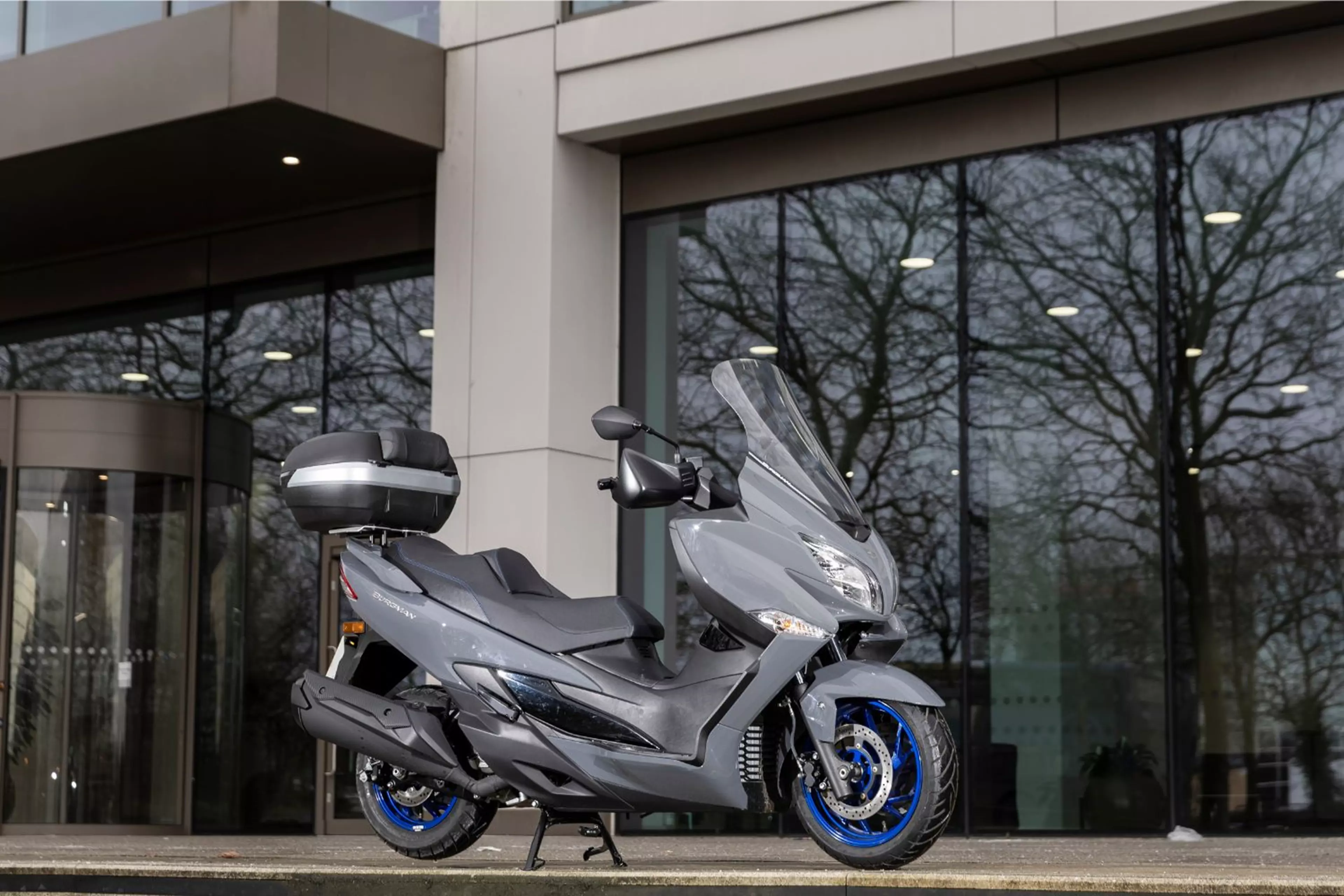 Suzuki Burgman 400 parked outside office building