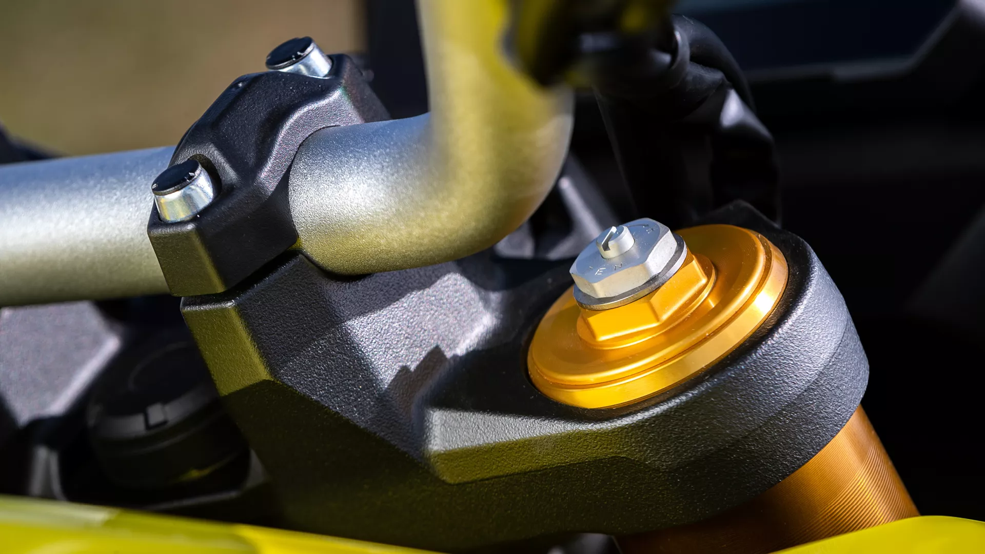 Suzuki V-Strom 800DE top of the right hand fork close up
