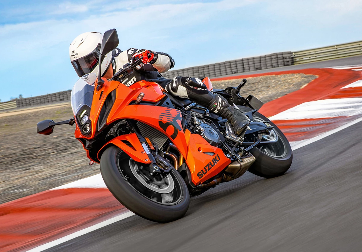 Suzuki GSX-8R leaning into a corner on track