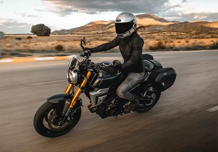 Suzuki GSX-8T moving along a country road