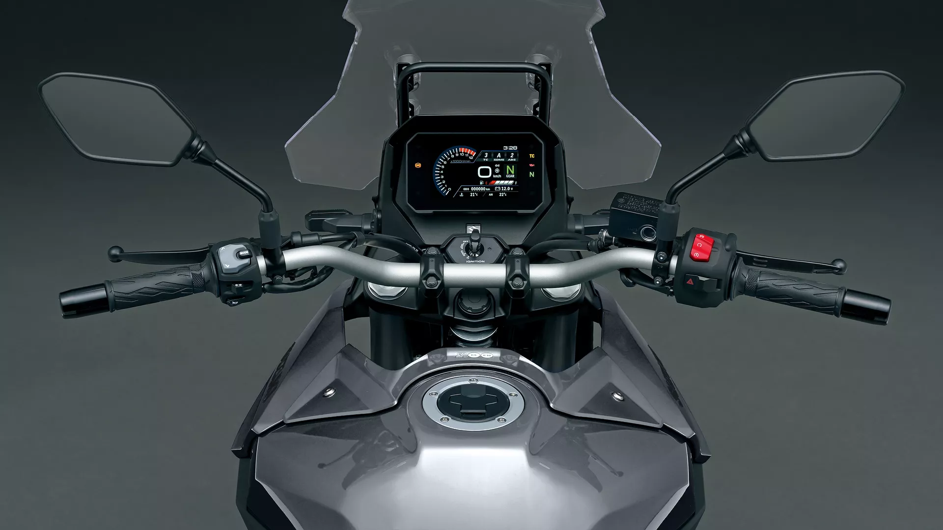Suzuki V-Strom 800RE grey, looking down on the tank, bars and screen