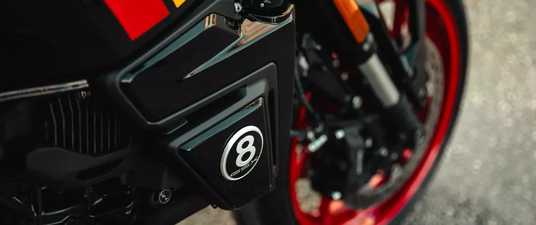 Suzuki GSX-8TT 8-ball logo and front wheel right hand side close-up
