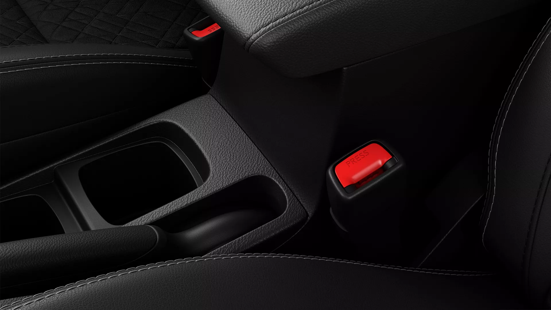 Close-up of the Suzuki Vitara’s rear centre console featuring integrated twin cup holders.