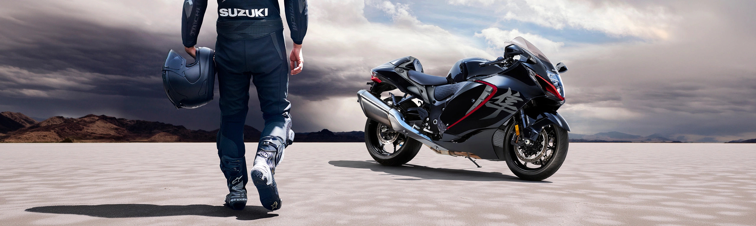 Suzuki Hayabusa black right hand front three quarters with a blue sky behind
