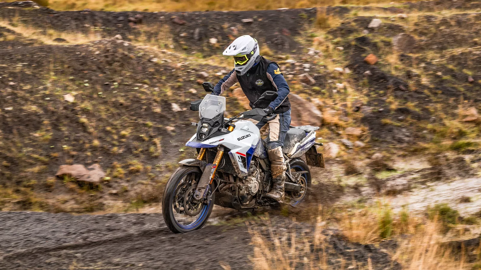 Suzuki V-Strom 800DE pushing on through a water splash