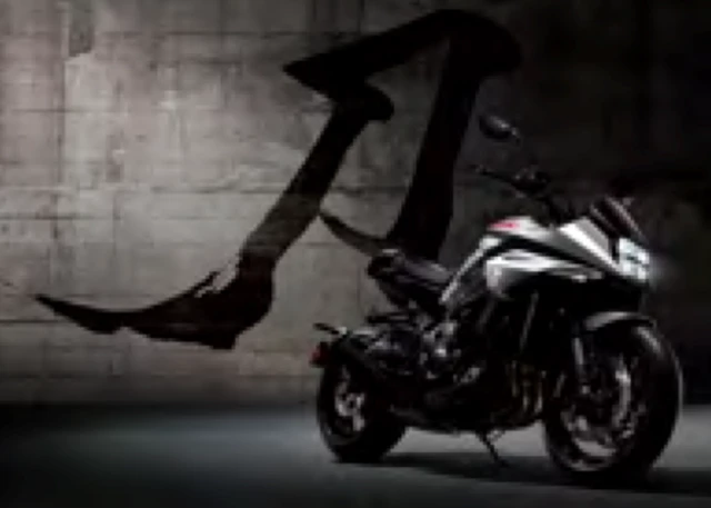 Suzuki Katana motorcycle in dark warehouse setting