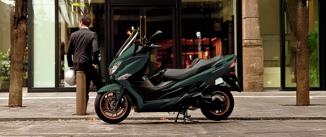 Suzuki Burgman 400 static on a city street. 