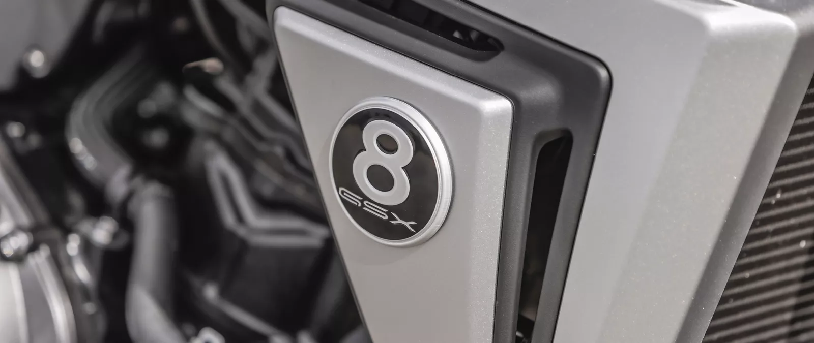 Suzuki GSX-8T right hand side 8-ball logo close up