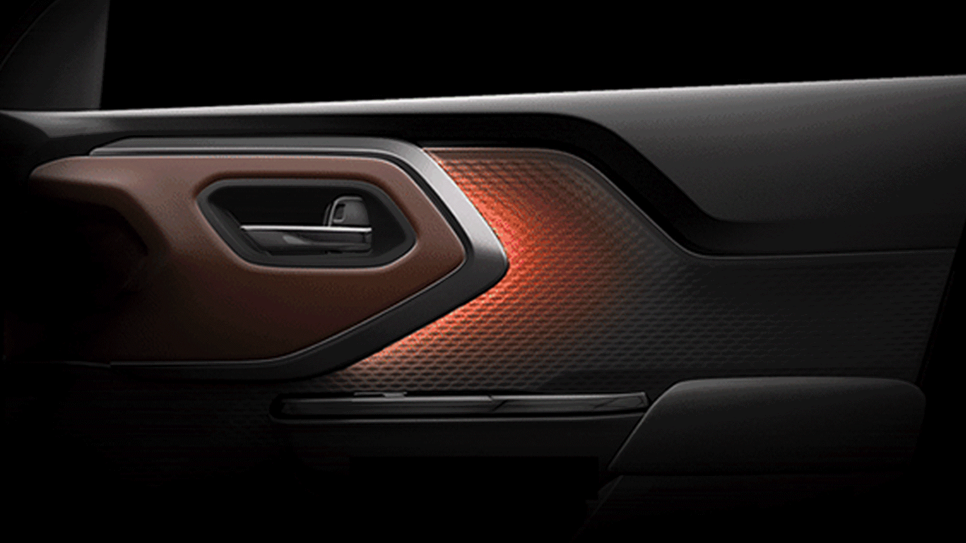 Suzuki e Vitara’s door panel featuring ambient interior lighting with a purple glow