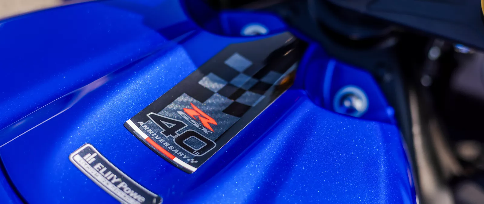 Suzuki GSX-R1000R blue, close up of the tank showcasing the 40th anniversary tank sticker.