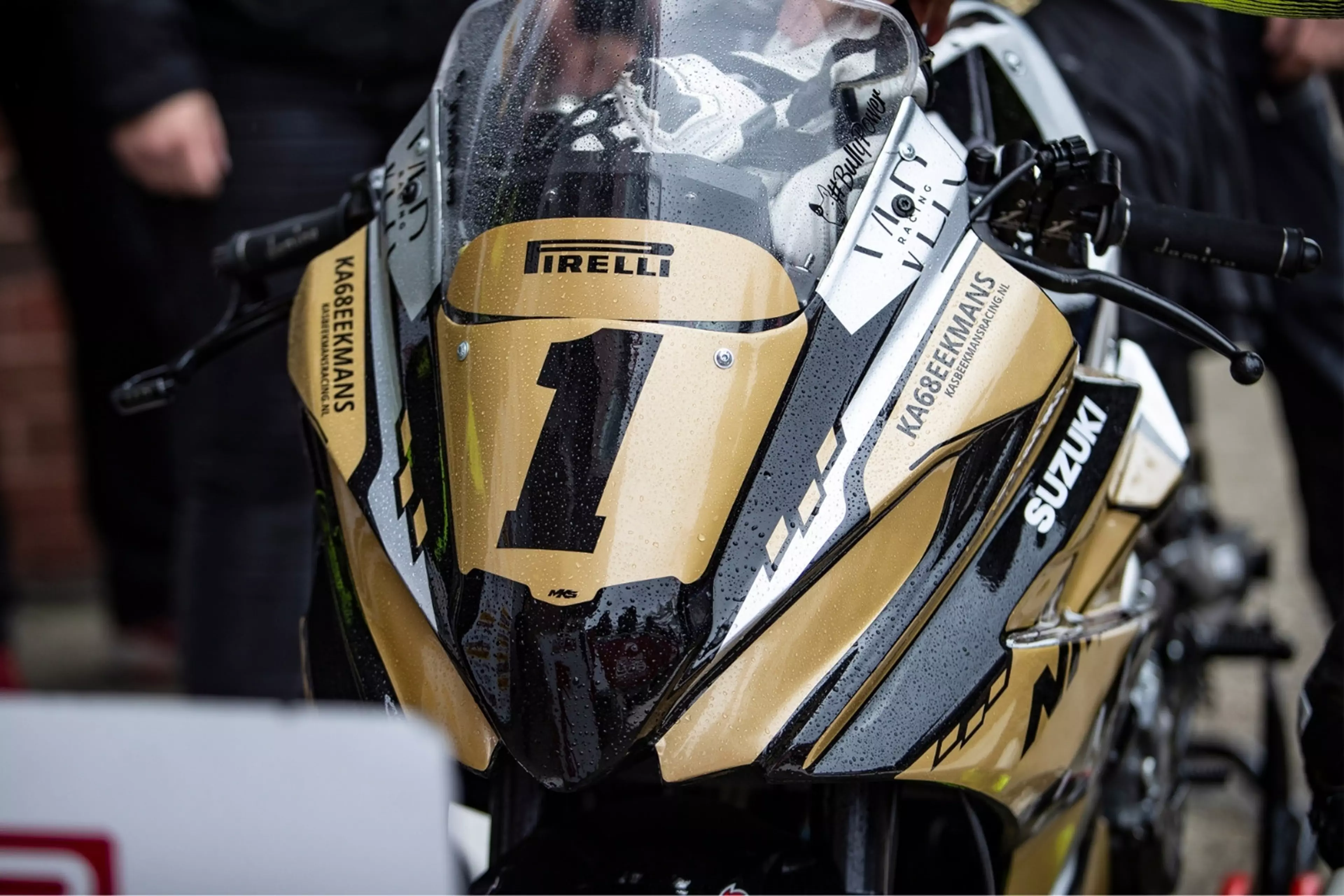 Suzuki 8R with the number one plate