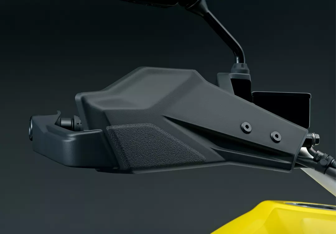Detailed close-up of the Suzuki V-Strom 800DE's knuckle guard