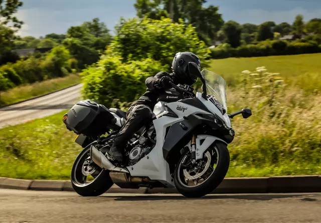 Suzuki GSX-S1000GT+ on a country road