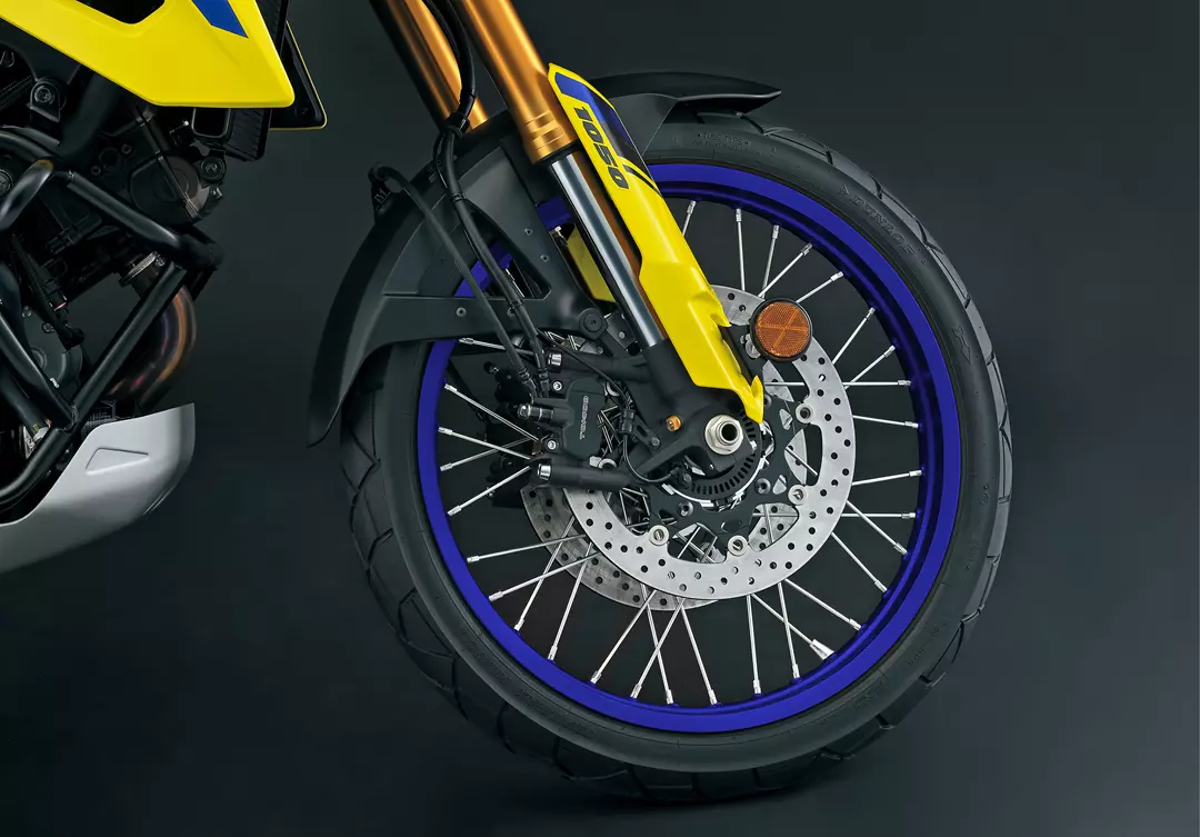 Suzuki V-Strom 1050DE front wheel and forks right hand side close up
