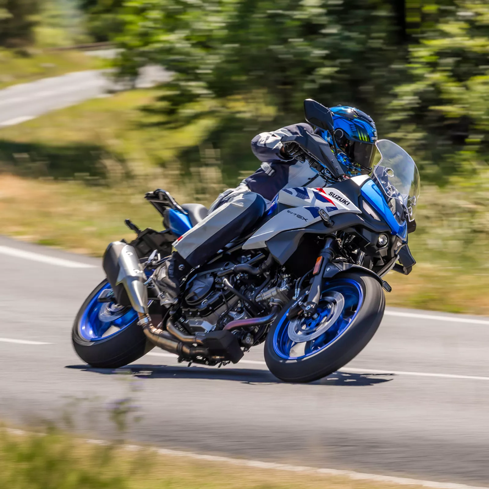 Suzuki SV-7GX leaning into a bend on a country road. 