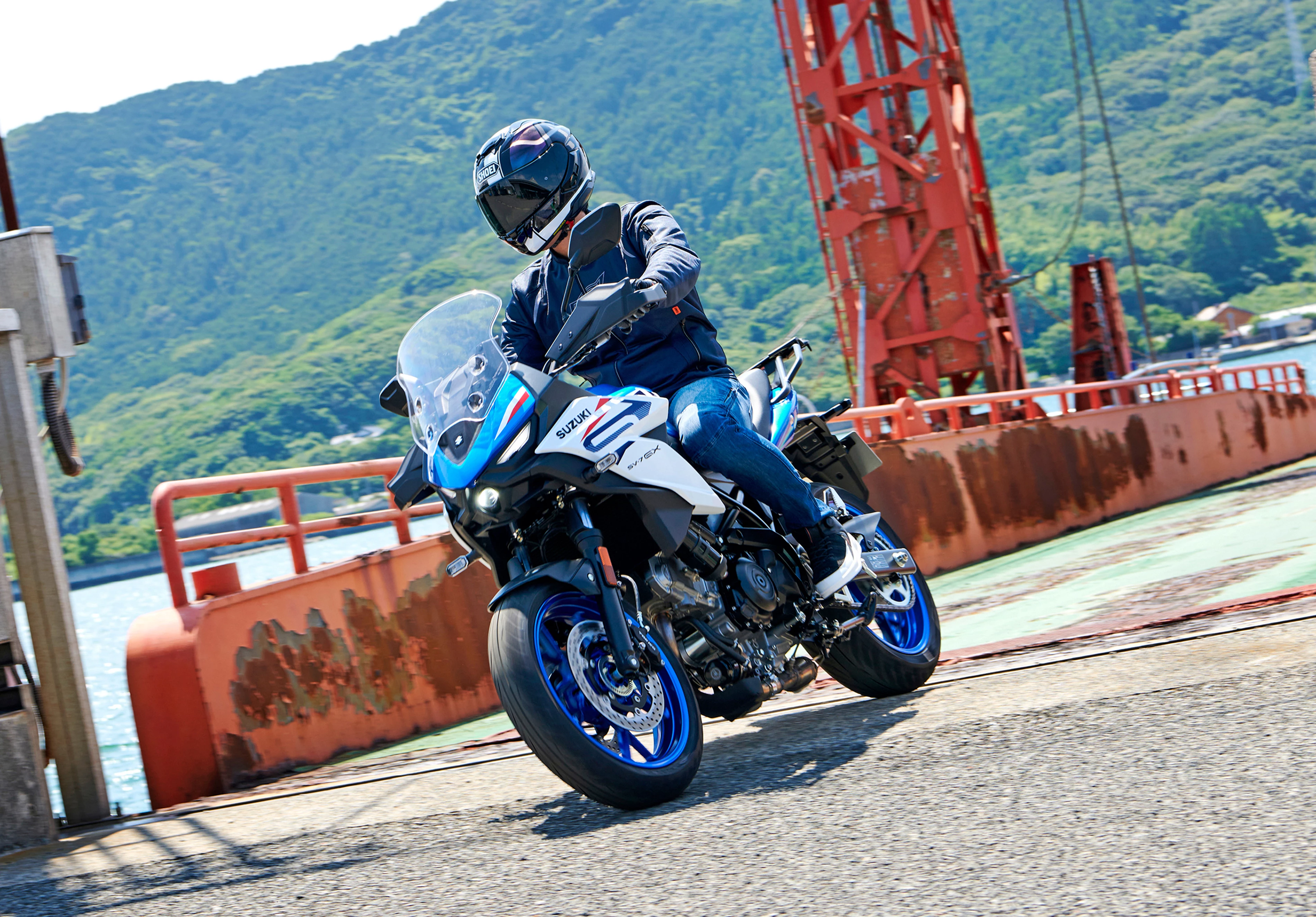 Suzuki GSX-8R Kiiro limited edition beauty shot right hand side with rider, static.