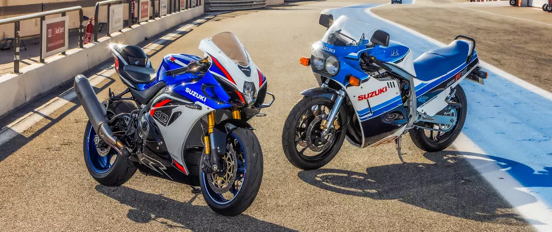 Suzuki GSX-R1000R with classic GSX-R in pitlane