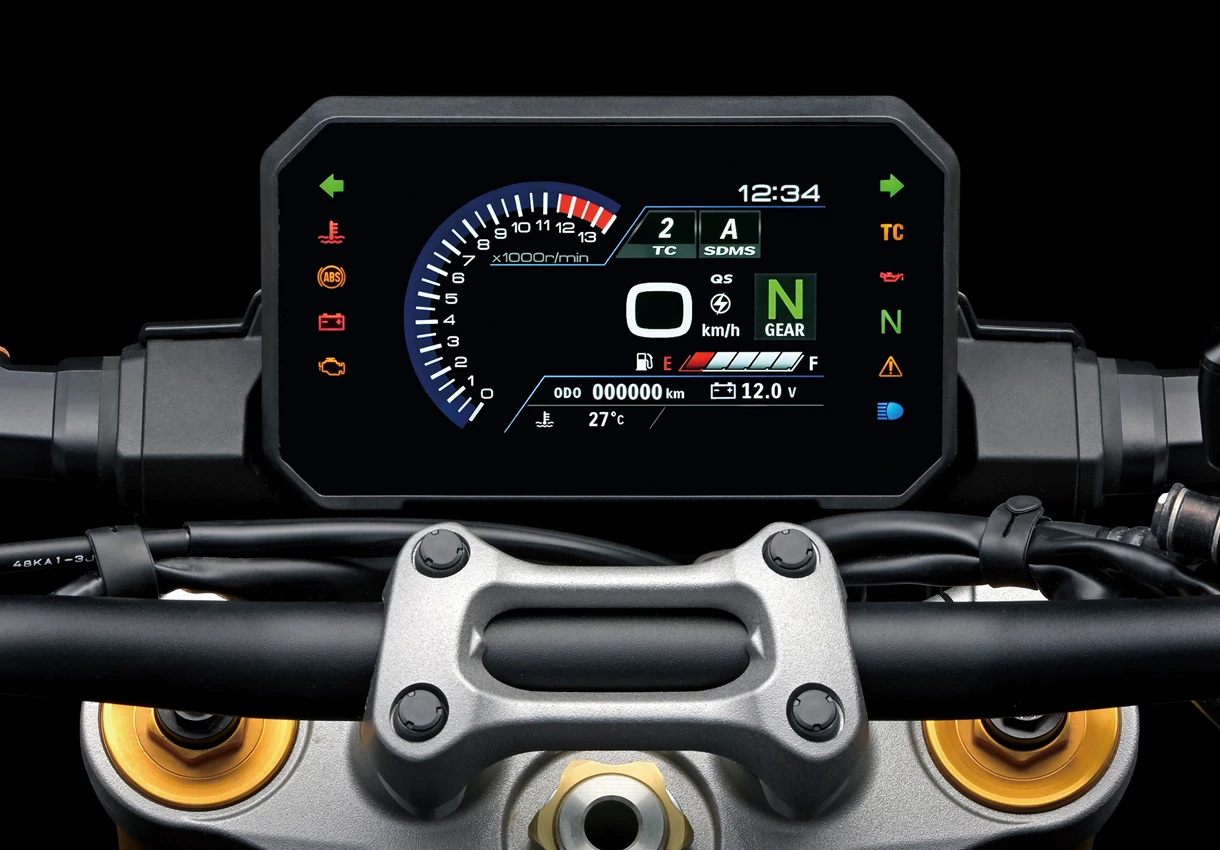 Suzuki GSX-S1000 LCD Instrument dash display close-up with a grey studio background