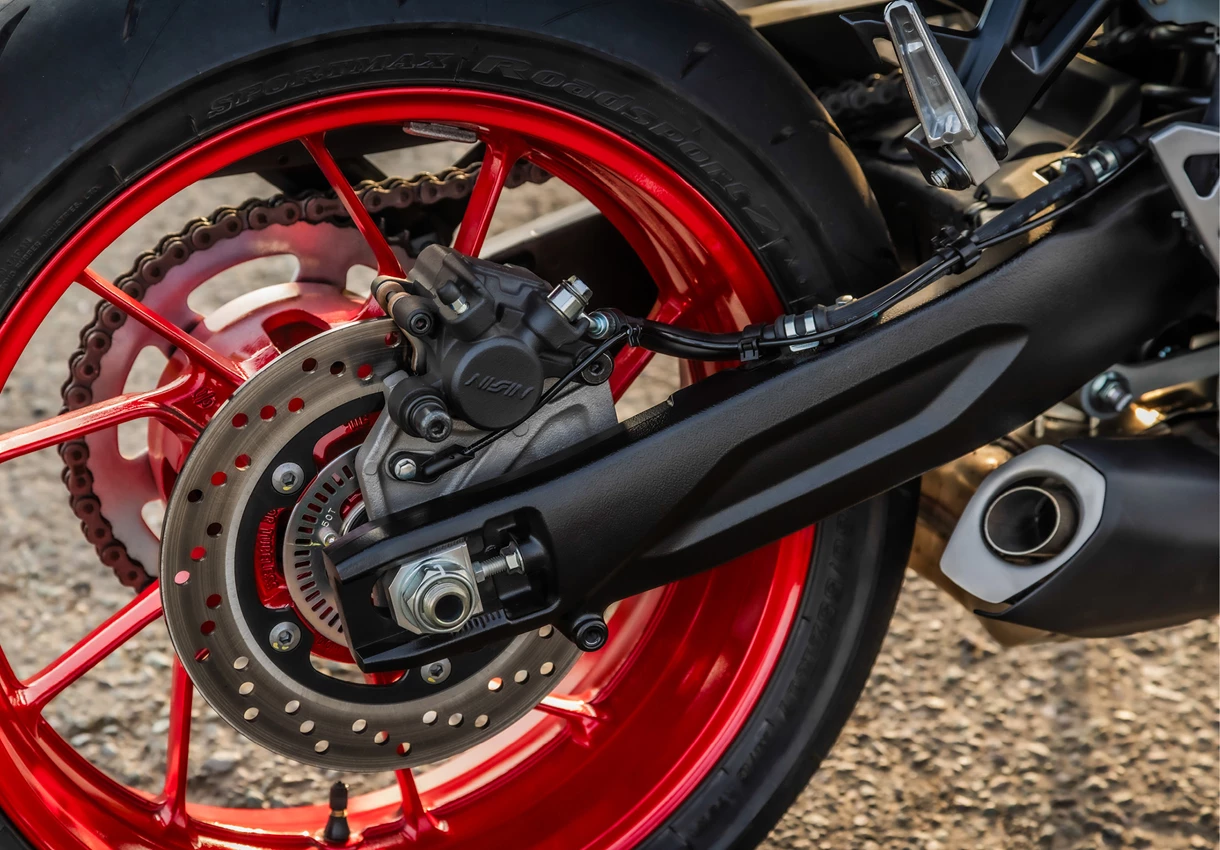 Suzuki GSX-8S swingarm close-up, studio.