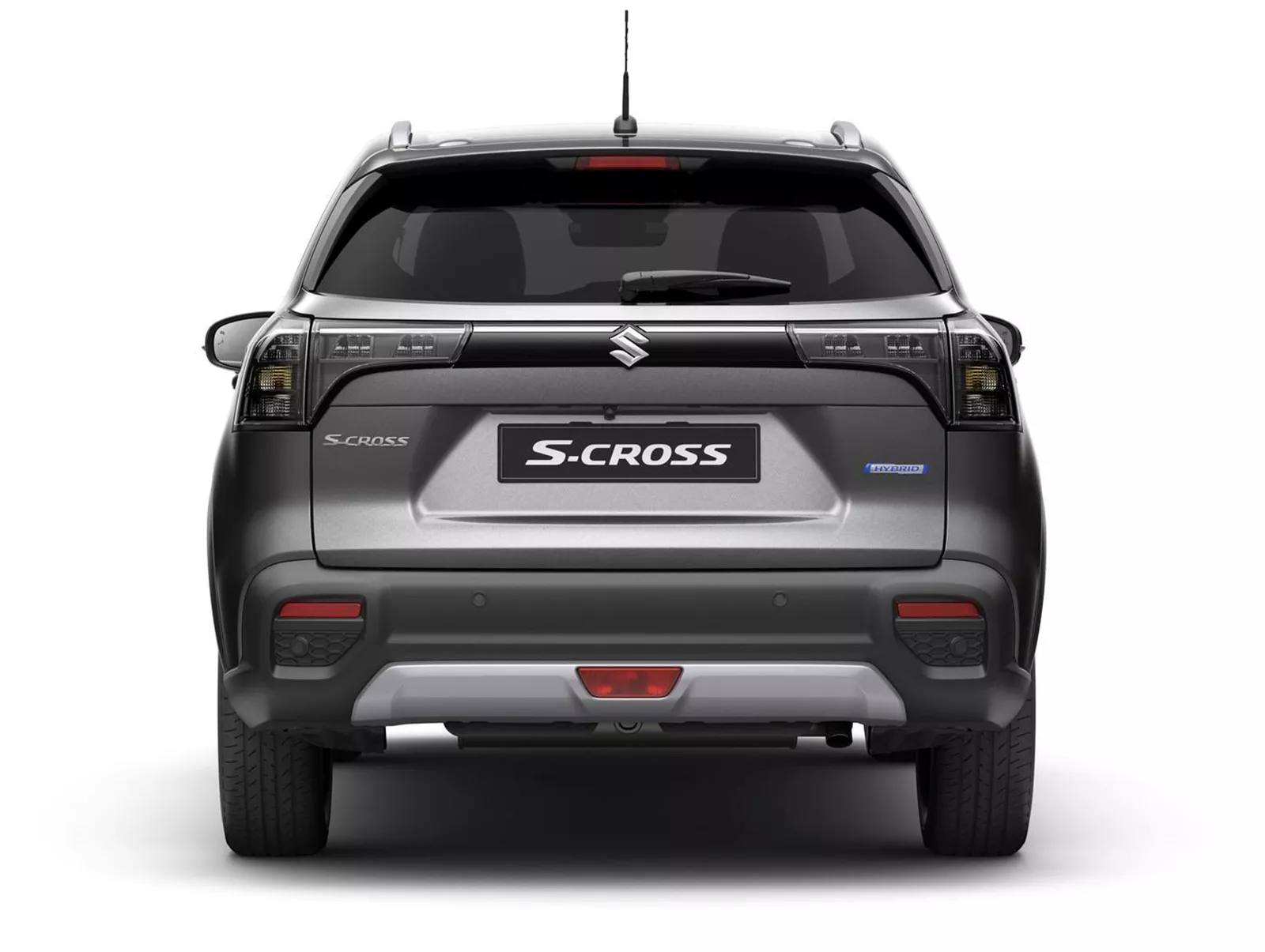 Close-up of the Suzuki s-cross rear tailgate showing the Hybrid badge beneath the tail light, highlighting its electrified drivetrain.