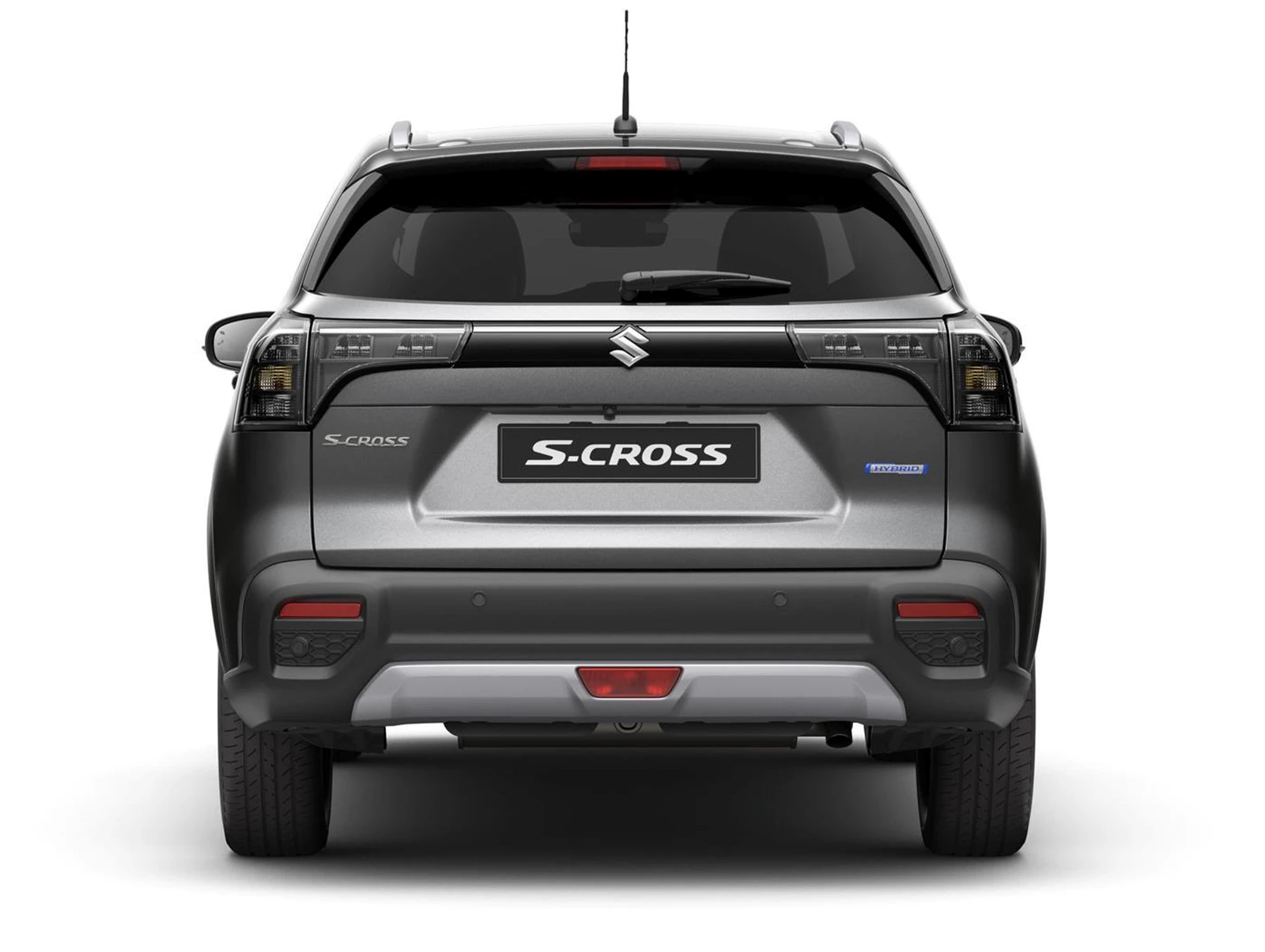 Close-up of the Suzuki s-cross rear tailgate showing the Hybrid badge beneath the tail light, highlighting its electrified drivetrain.
