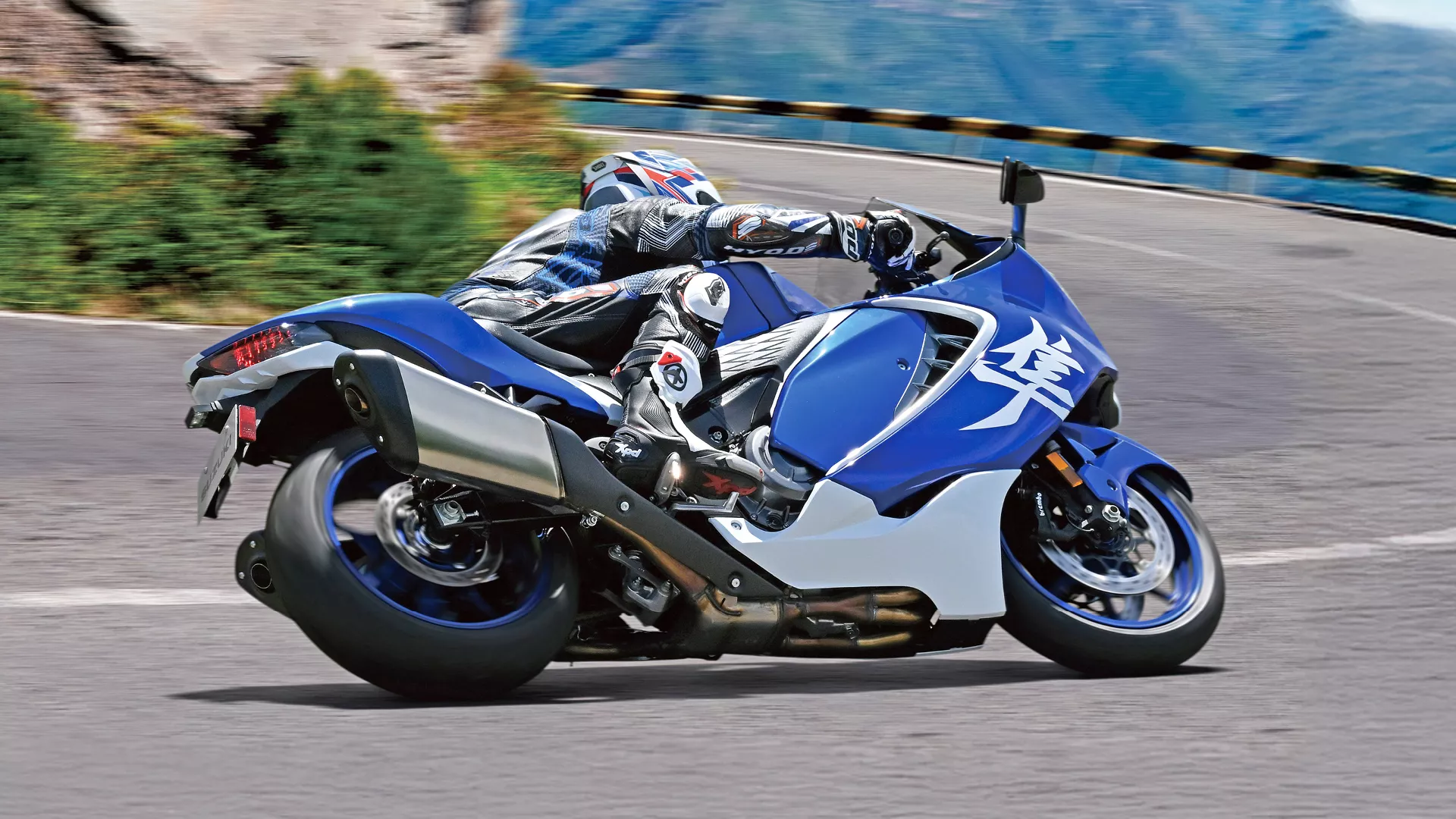 Suzuki Hayabusa Special Edition leaning hard into a corner on a sea road