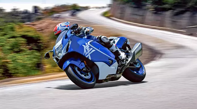 Suzuki Hayabusa Special Edition leaning hard into a corner on a mountain road