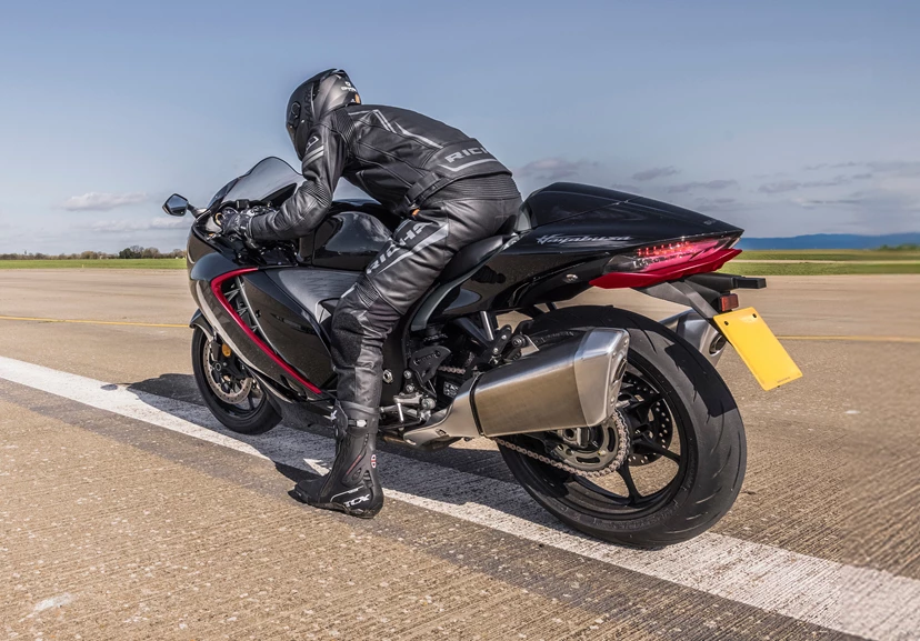 Suzuki Hayabusa side on static with rider on a track