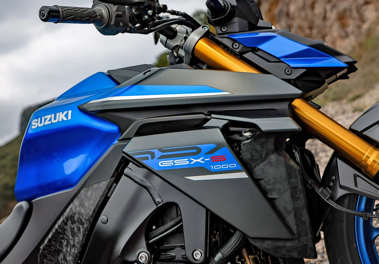 Suzuki GSX-S1000 fuel tank and chassis close-up on location.