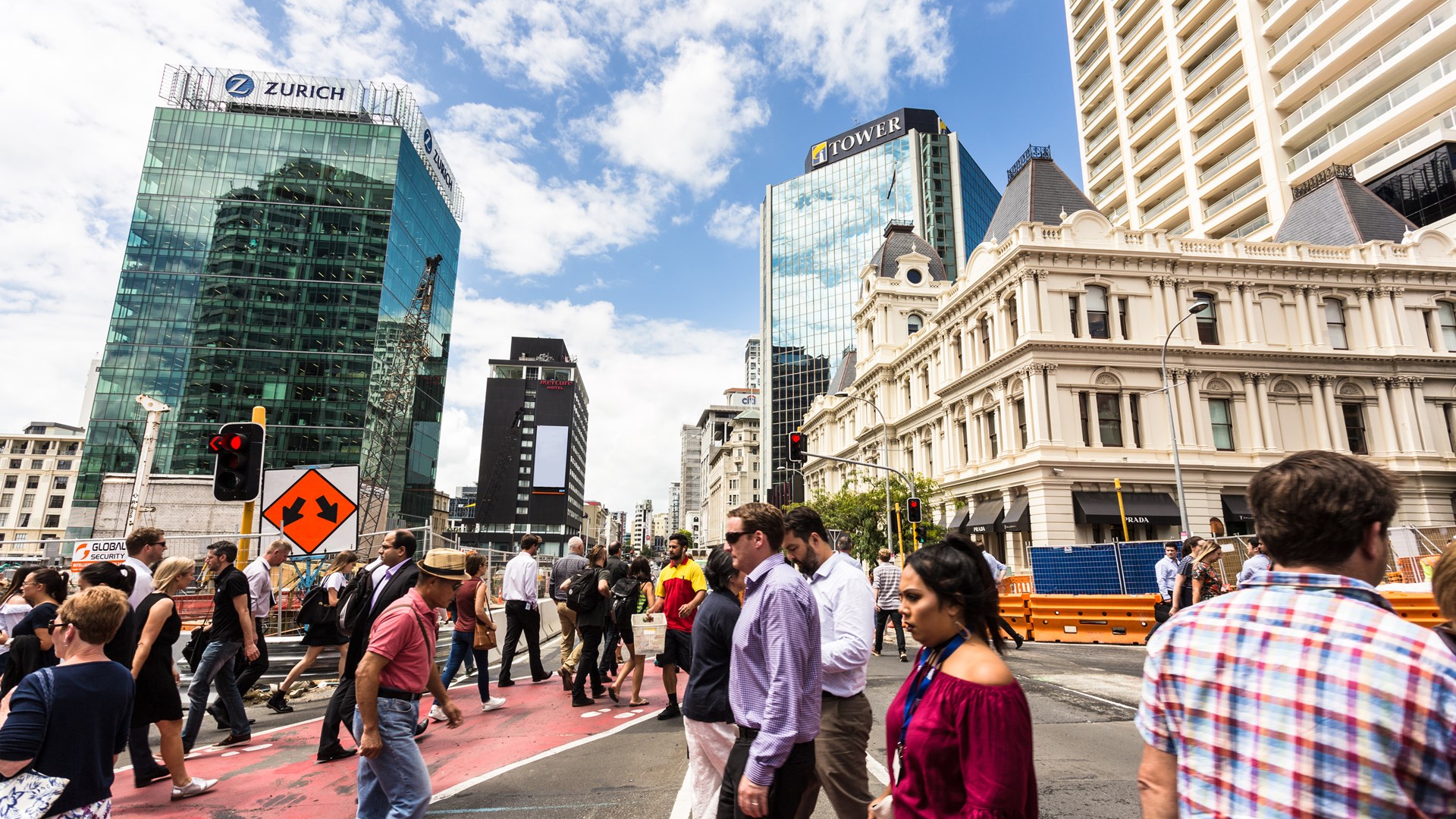 Pedestrians crossing near the construction site of the Auckland City Rail Link. Source: AsianDream, iStock by Getty Images.