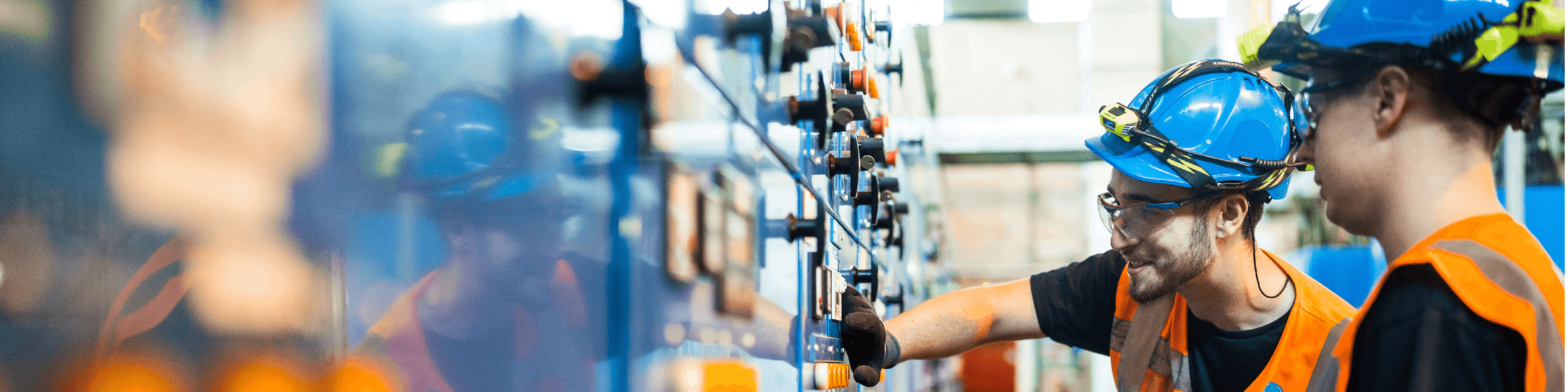 technician operates motor control panel 4800X1200