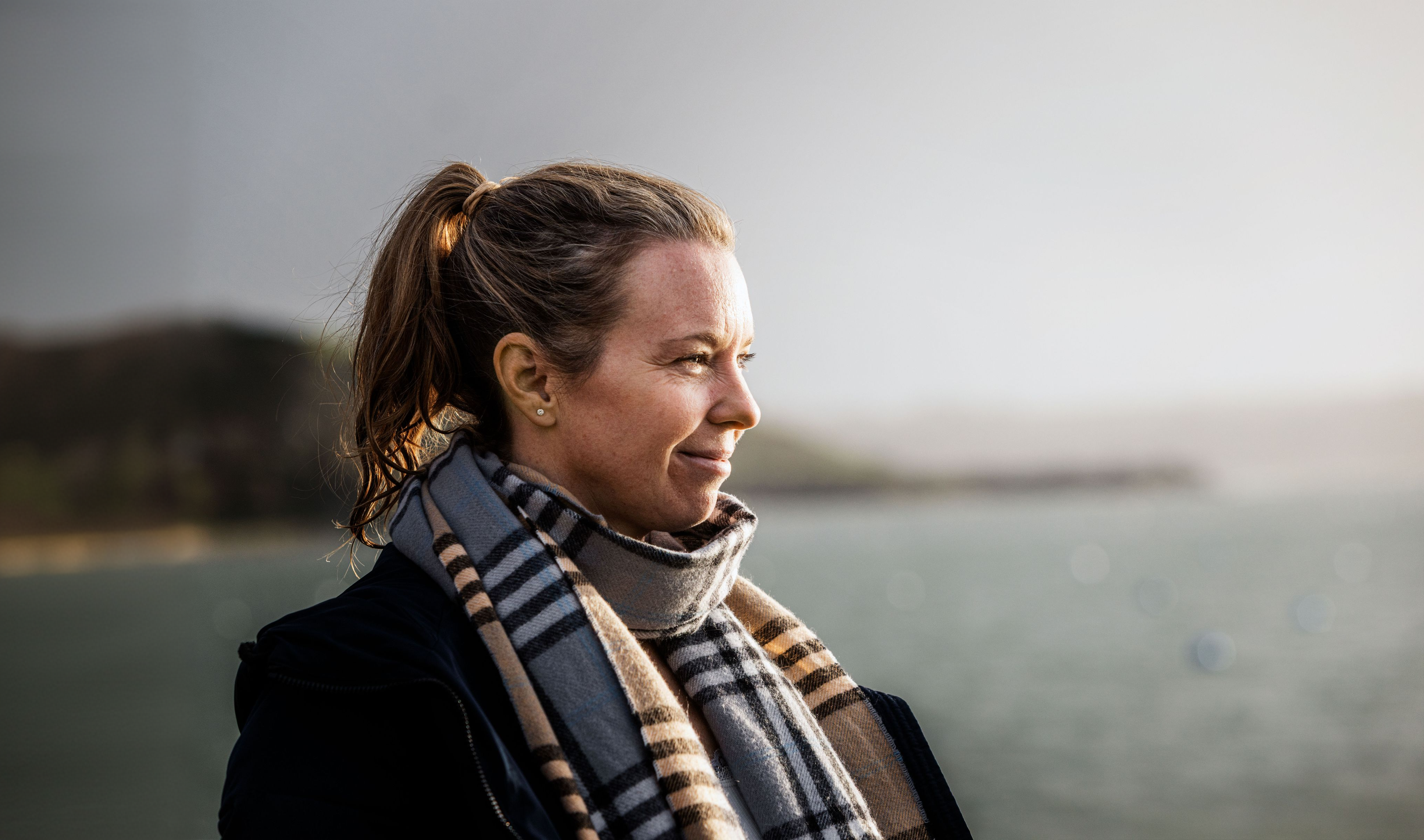Woman looking out at the sea