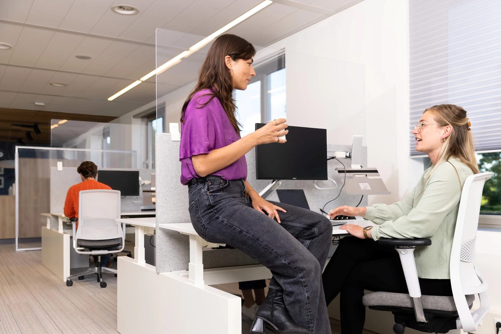 Collega's bespreken de vakantie