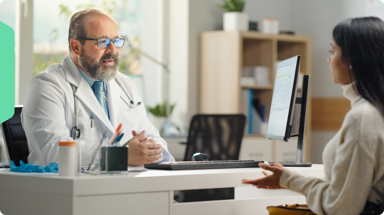 A doctor having a discussion with his patient