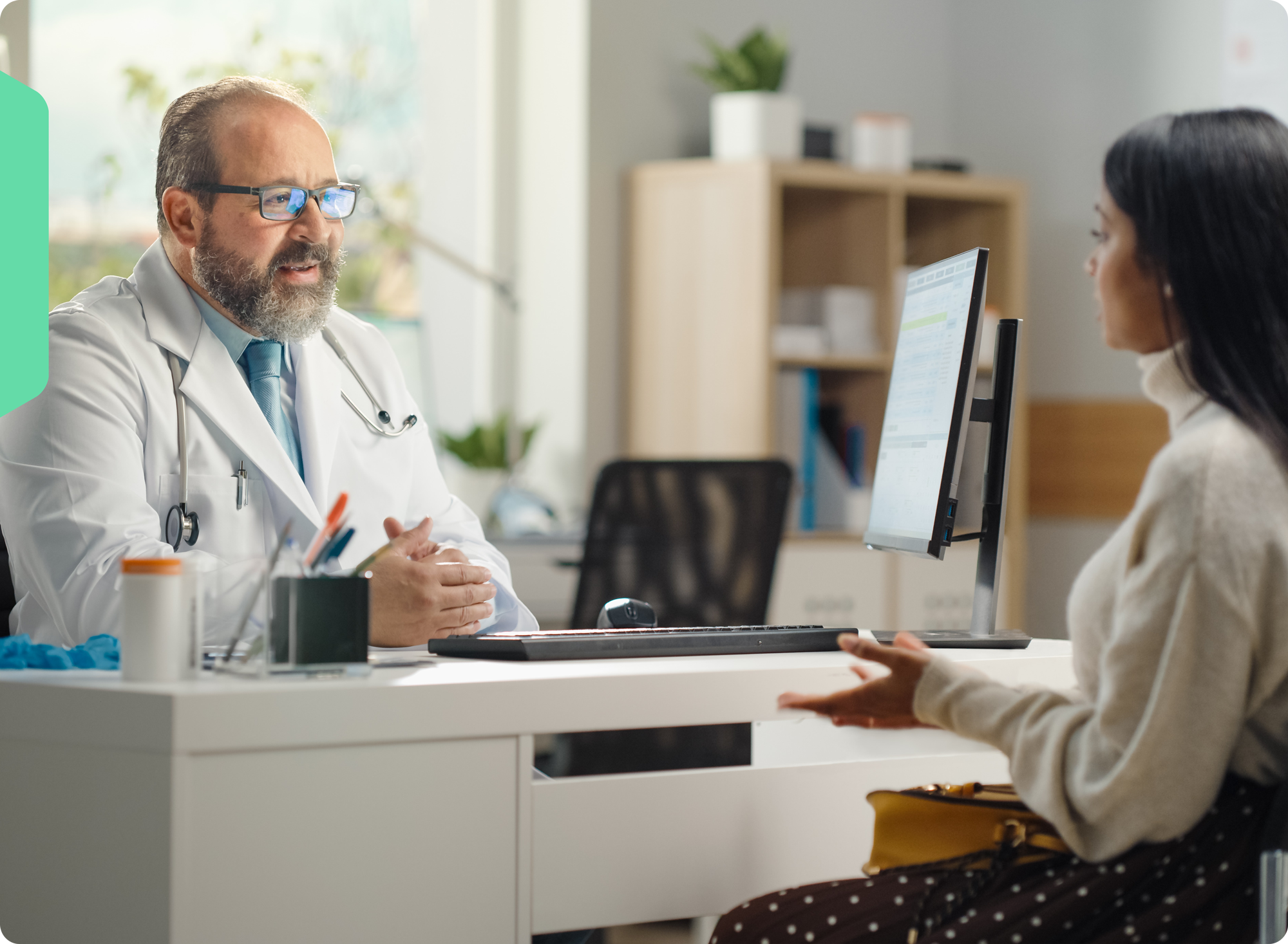 A doctor having a discussion with his patient